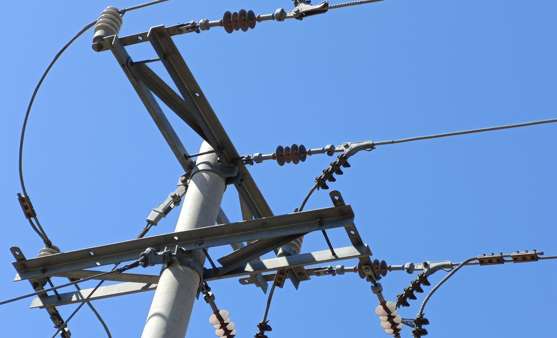 Braced crossarm framing in service on an overhead line structure