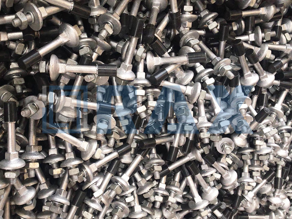 Galvanized steel insulator pins with protective caps before packing