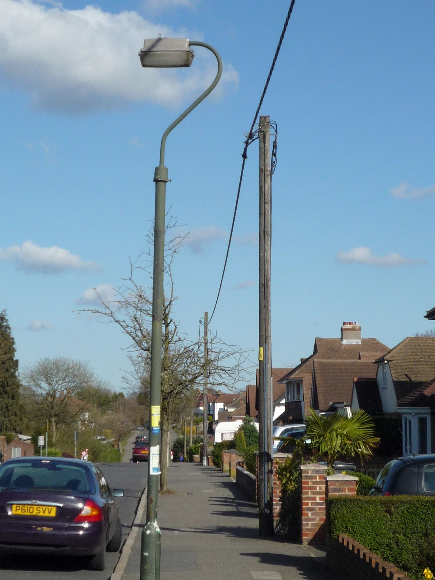 Aerial bundled cable terminated on a wooden distribution pole