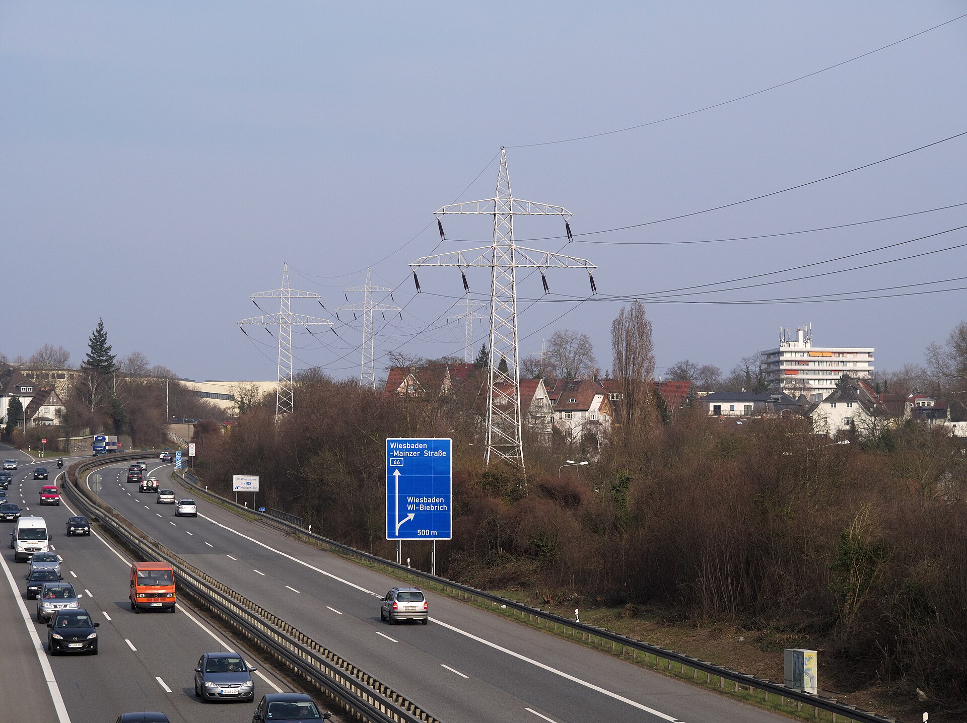 Dead-end transmission towers carrying tension insulator strings