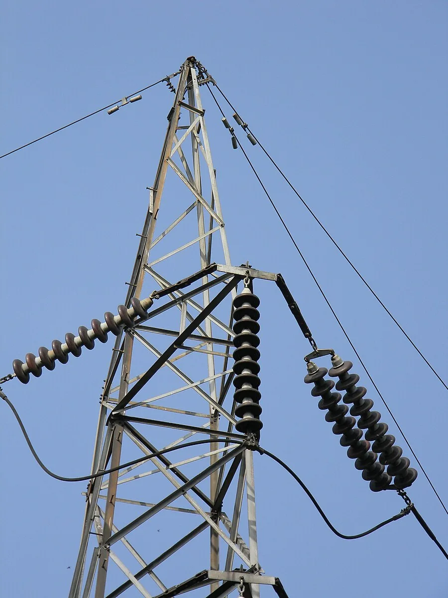Tension strings with composite insulators on a transmission tower