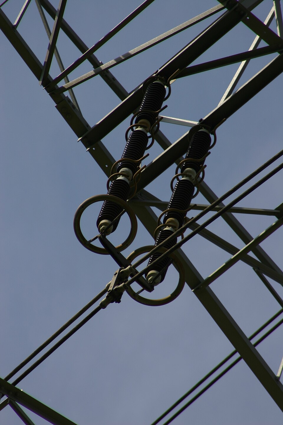Corona rings fitted at the line-end insulators of a transmission tower