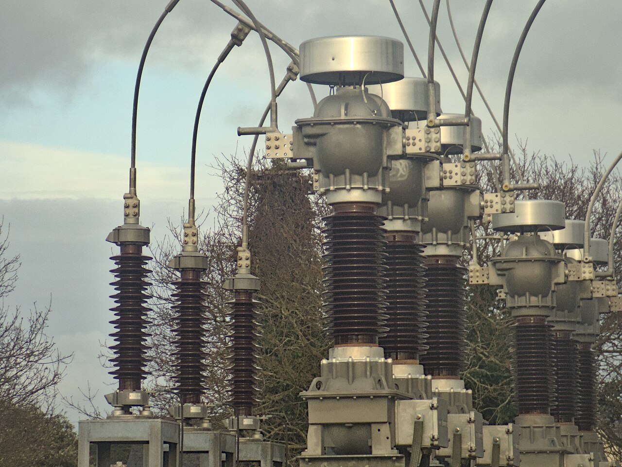 Surge arresters and current transformer in a substation yard