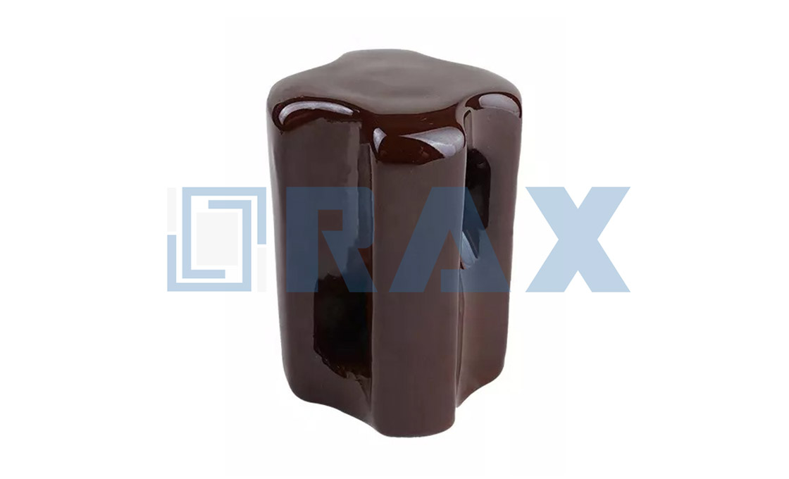 Single brown glazed porcelain stay insulator with side tie opening on a white background