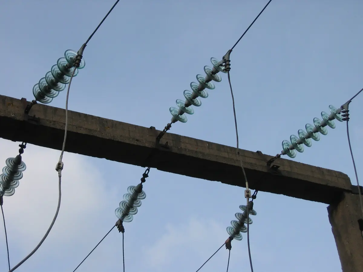 High voltage transmission insulators on an overhead line